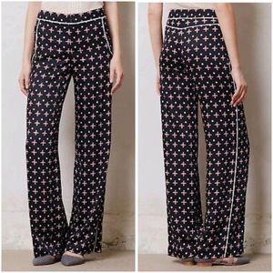 Anthropologie Black Wide-Leg Pants with Pink Cross Print